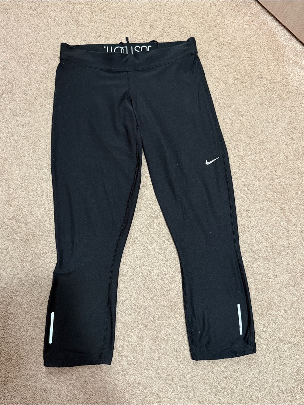 Nike Black Capri Leggings with fold down waistband that says “JUST DO IT”